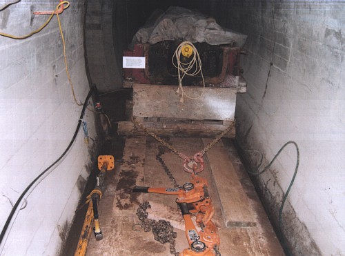 The Ruston-Hornsby being winched along a tunnel to the engine-room, as was original one during the war.